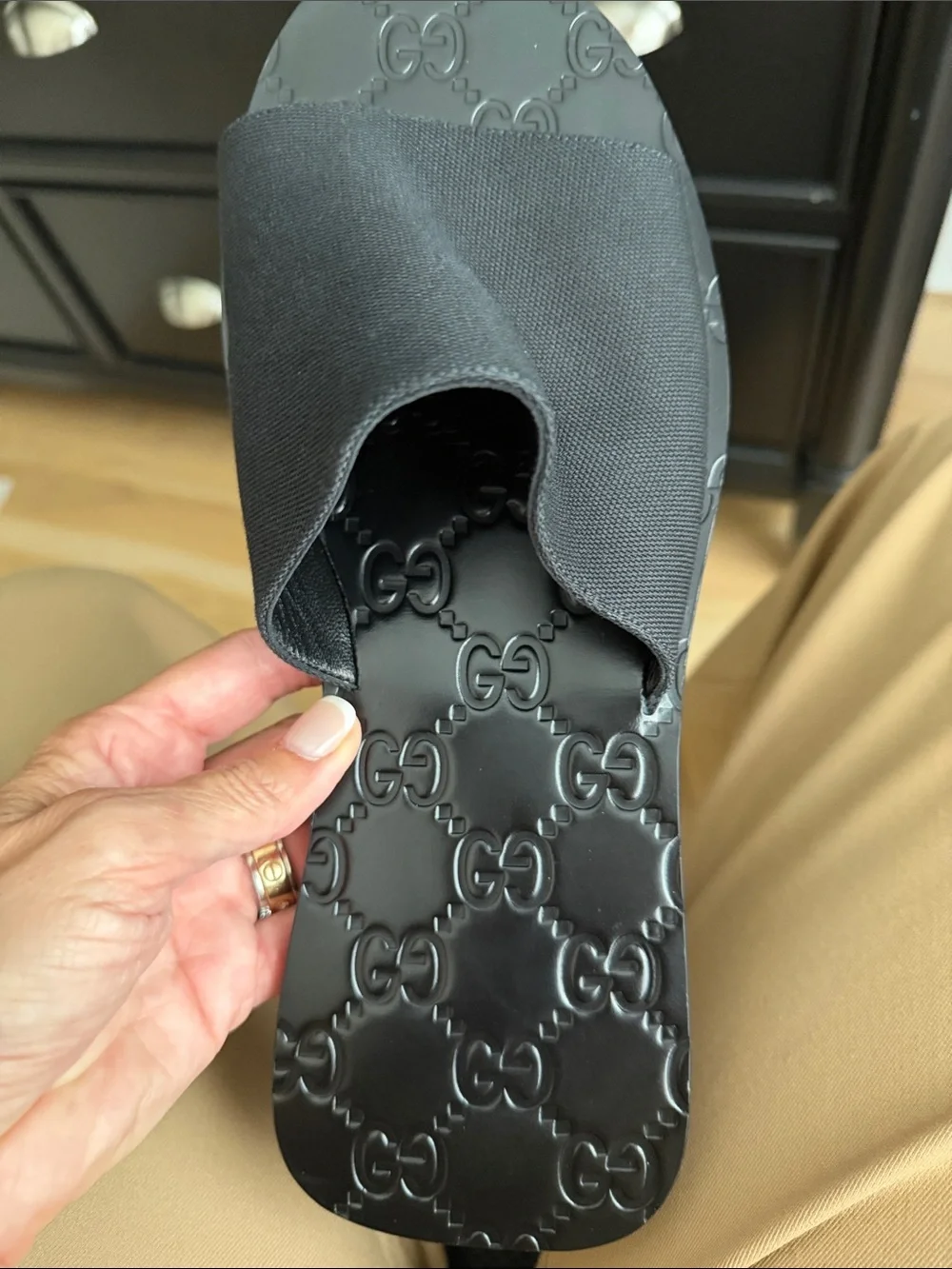 Gucci Men’s Black Embossed Logo Slide Sandals